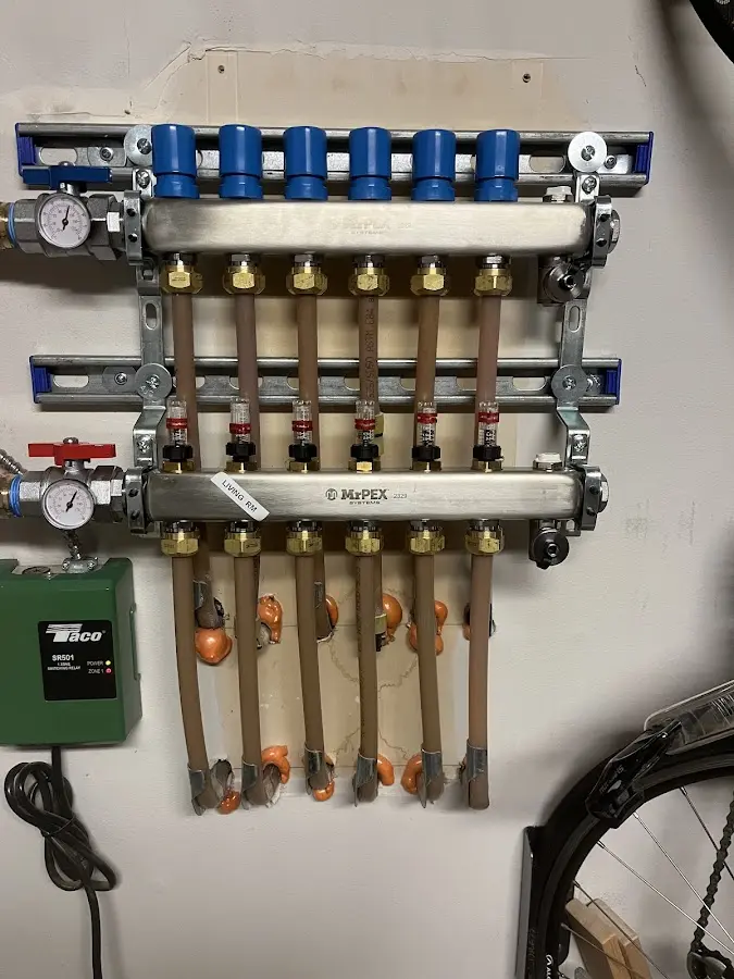 Plumber performing Water Heater Repair at a residential property in Estacada